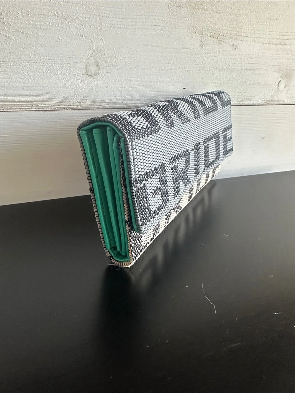 Textured Logo Clutch in Gray and Cream